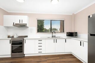 2 Bedroom Apartment | Private kitchen | Mini-fridge, coffee/tea maker, electric kettle