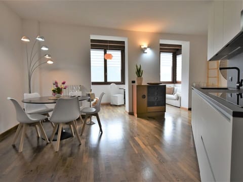 Property, Furniture, Cabinetry, Building, Table, Plant, Countertop, Wood, Gas Stove, Lighting