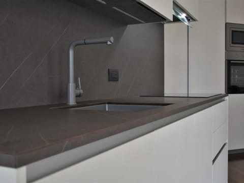 Building, Cabinetry, Countertop, Tap, Flooring, Kitchen Appliance, Automotive Exterior, Wood, House, Major Appliance