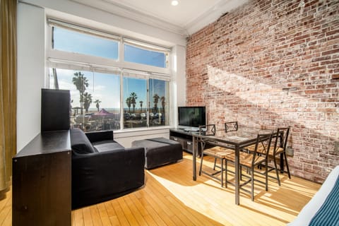 Large Oceanfront Studio | Living room | Flat-screen TV