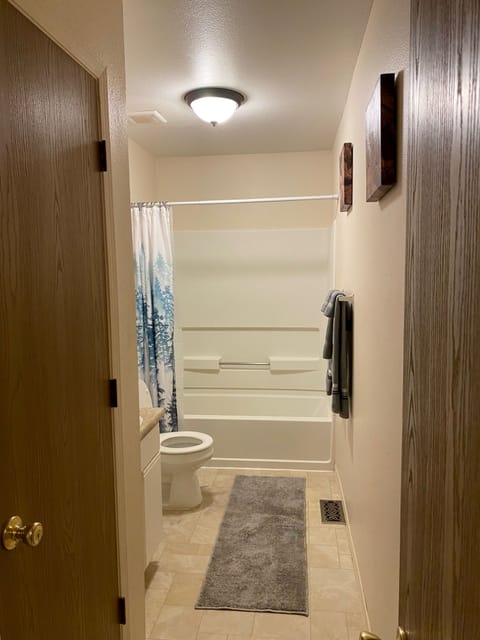 Family Apartment | Bathroom | Hair dryer, towels, shampoo