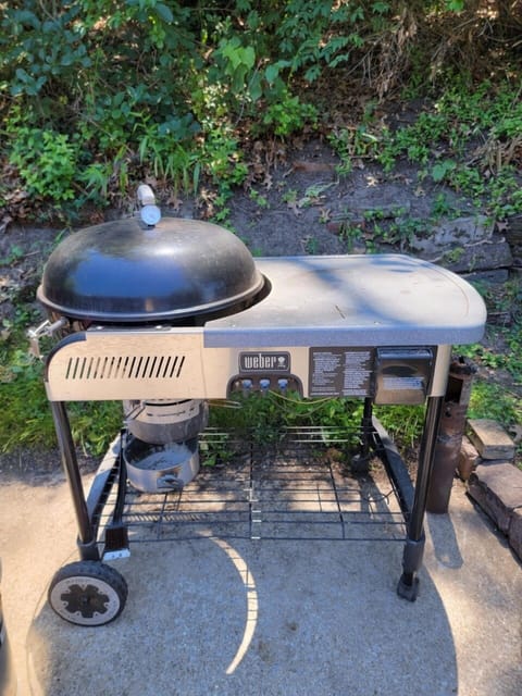 A large Weber charcoal grill is at your disposal for delicious outdoor meals.