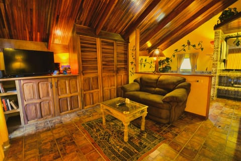 Honeymoon Suite, Jetted Tub, Lake View | Living area | 36-inch LED TV with satellite channels, TV