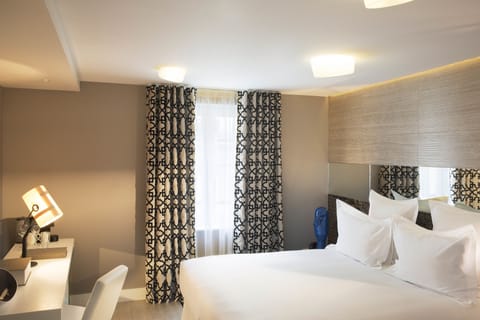 Premium bedding, minibar, in-room safe, soundproofing