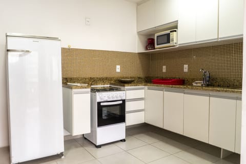 Apartment | Private kitchen | Fridge, microwave, blender, cookware/dishes/utensils