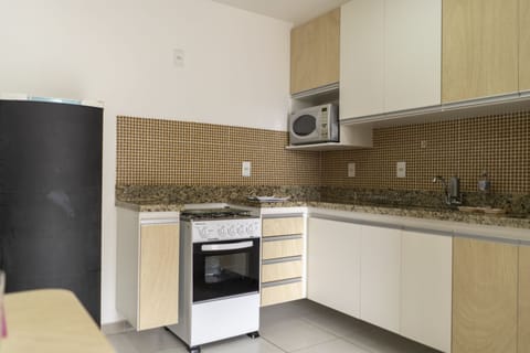 Apartment | Private kitchen | Fridge, microwave, blender, cookware/dishes/utensils