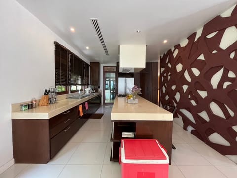 Villa, 5 Bedrooms | Private kitchen | Fridge, microwave, coffee/tea maker, highchair