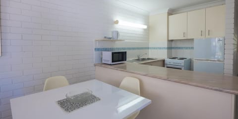 Apartment, 2 Bedrooms | Private kitchen | Full-size fridge, microwave, stovetop, coffee/tea maker