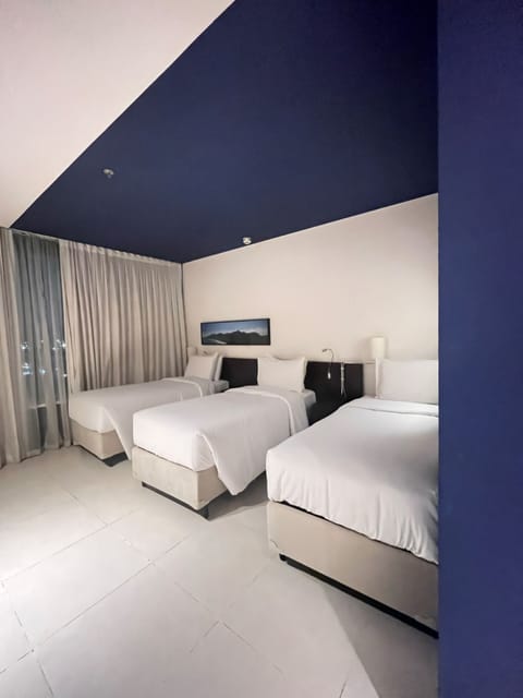 Superior Room, 3 Twin Beds, Non Smoking | Minibar, in-room safe, laptop workspace, blackout drapes