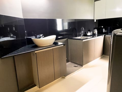 Standard Room | Private kitchen | Fridge, microwave, electric kettle, cookware/dishes/utensils