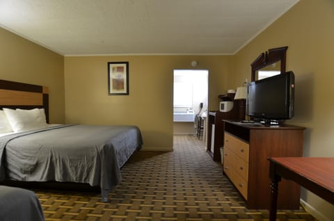 Standard Room, 2 Queen Beds | Desk, laptop workspace, free WiFi