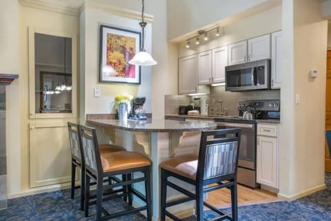 Deluxe Condo, 1 Bedroom | Private kitchen | Fridge, microwave, stovetop, dishwasher