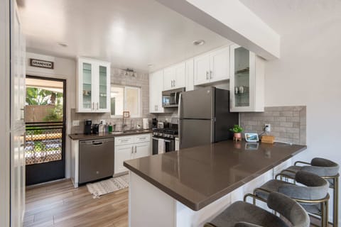 A freshly renovated kitchen is stocked with all high-quality essentials.