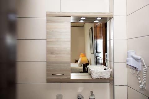 Classic Triple Room | Bathroom | Shower, rainfall showerhead, towels, soap