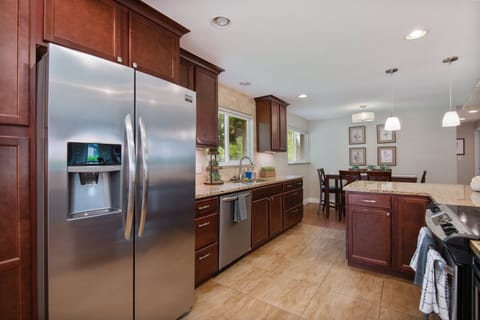 Cook with ease in the fully equipped kitchen, offering plenty of counter space and a dishwasher.