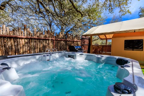 Tent yard with hot tub