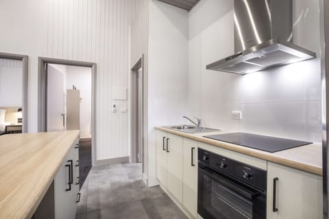 Family Apartment | Private kitchenette | Fridge, electric kettle