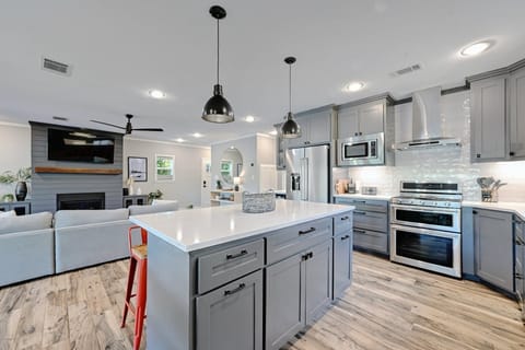 Enjoy stainless steel appliances in this stocked kitchen