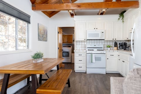 Table pulls out, can seat six.