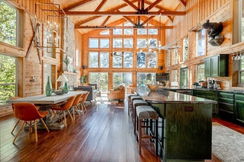 A view of your open-concept kitchen, dining, and living areas.