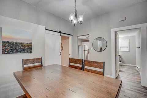 Gather 'round the Table! Accommodating up to 6, it's the Perfect Setting for Memorable Meals and Heartfelt Conversations with Loved Ones.