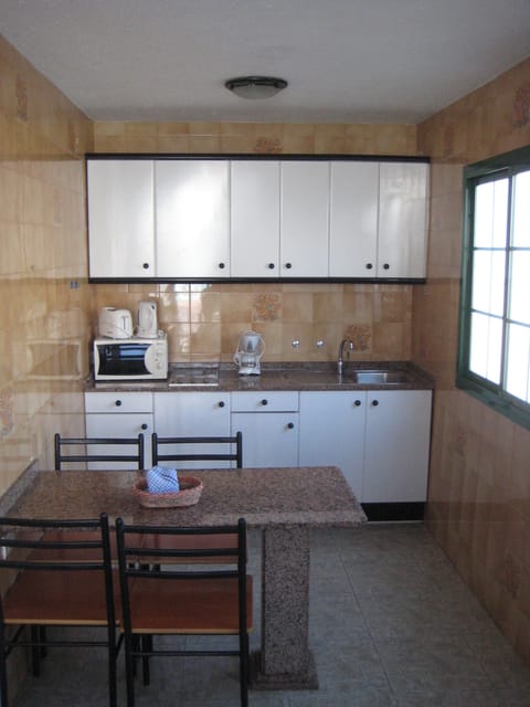 Basic Apartment | Private kitchen | Full-size fridge, microwave, stovetop, toaster