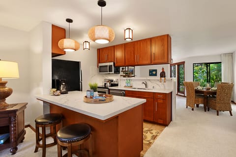 Full Kitchen with dishes, pots and pans, utensils, 6 egg timer, toaster, rice cooker, tea kettle, immersion blender, mini waffle maker, blender.