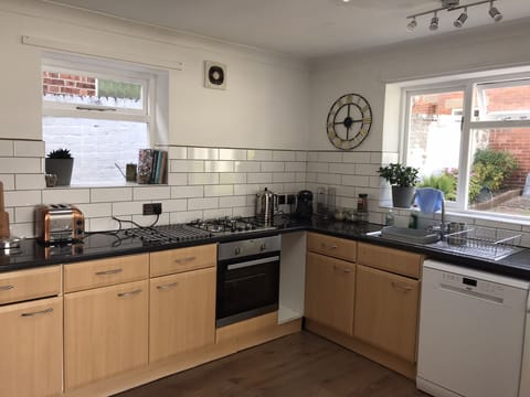 Fully equipped kitchen including new dishwasher and coffee pod machine.