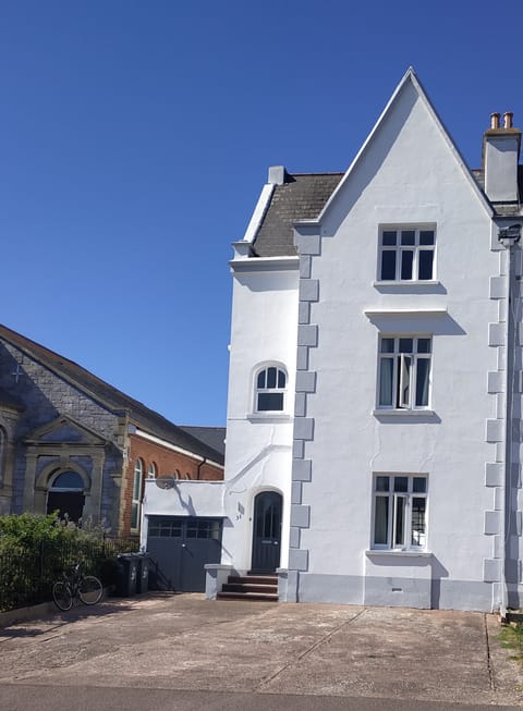 In town but still a calm and peaceful house. Parking for at least three cars.