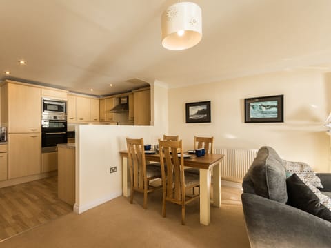 Living area with modest dining area | 13 Great Cliff - Great Cliff, Dawlish