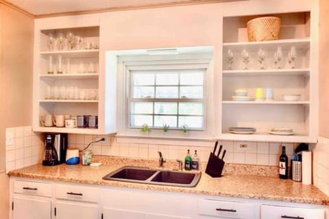 Complimentary coffee, tea, hot chocolate in a fully equipped kitchen.