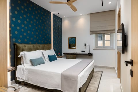 Grand Suite | Premium bedding, down comforters, individually decorated