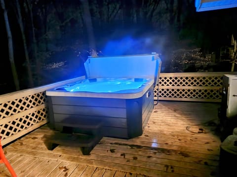 This tub has color changing LED lighting , Bluetooth radio, 1 lay down, seats 5