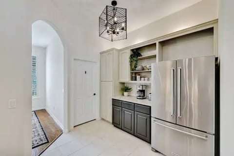 Kitchen with large fridge and freezer