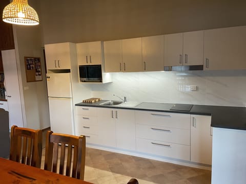 Standard Cabin | Private kitchen | Fridge, microwave, stovetop, electric kettle