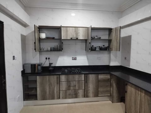 Apartment | Private kitchen | Fridge, microwave, oven, stovetop