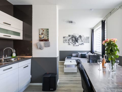 Property, Furniture, Cabinetry, Building, Plant, Interior Design, Flower, Couch, Kitchen Appliance, Wood