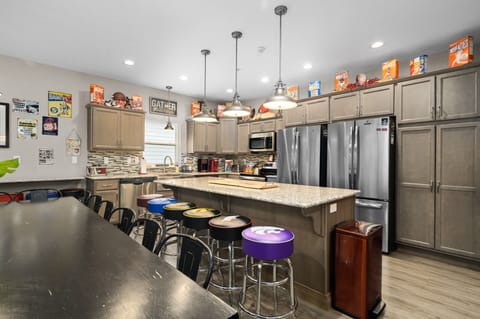 2 kitchens on main and lower floor. 3 total refrigerators in this home.