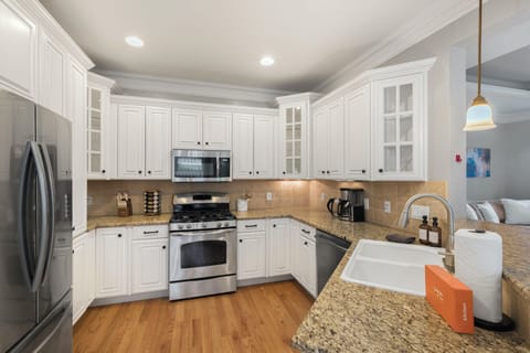 Beautiful Kitchen with Granite Counter Tops and Stainless Applia