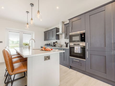 Kitchen | Apple Blossom Cottage - Coastal View Cottages, Ludchurch, near Narberth