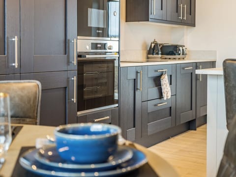 Kitchen area | Bay Tree Cottage - Coastal View Cottages, Ludchurch, near Narberth