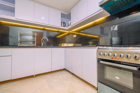 Apartment, 2 Bedrooms | Private kitchen | Fridge, stovetop, electric kettle, cookware/dishes/utensils