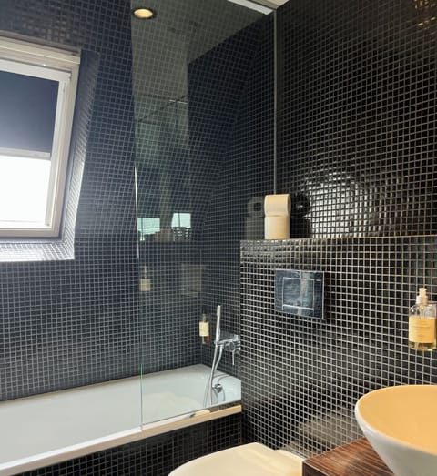 Standard Single Room | Bathroom | Designer toiletries, hair dryer, towels, soap