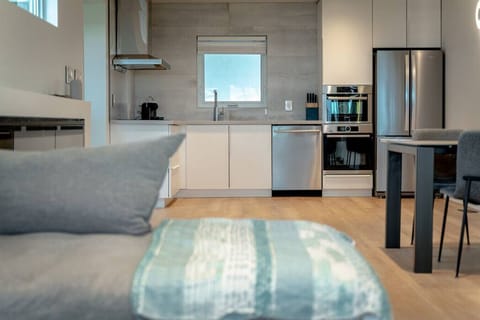 Living Area With Open Concept to Kitchen