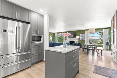 A fully remodeled chef's kitchen that is both beautiful, practical, and ready 4U
