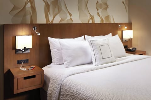 Down comforters, desk, laptop workspace, iron/ironing board