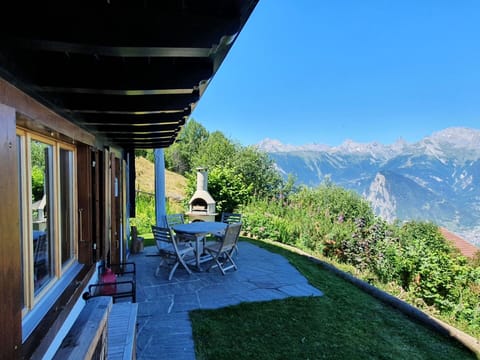 Plant, Sky, Mountain, Building, Shade, Porch, Grass, Outdoor Furniture, Leisure, Landscape