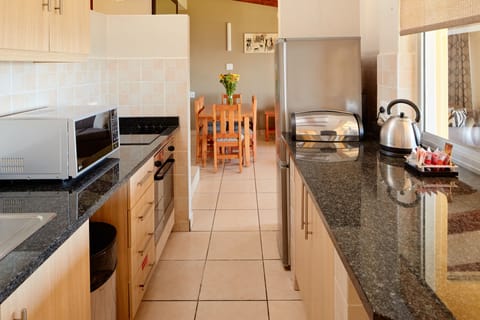 Chalet, 2 Bedrooms, Non Smoking | Private kitchen | Full-size fridge, microwave, oven, stovetop