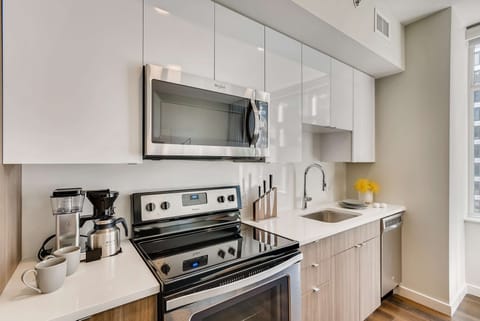 Studio, 1 Queen Bed | Private kitchen | Full-size fridge, microwave, oven, stovetop