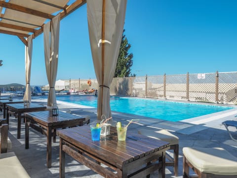 2 outdoor pools, pool umbrellas, sun loungers